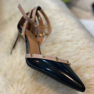 Heels. Black and studded heels. With ankle strap.